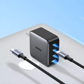 100W Gallium Nitride multi-port fast charger plug on a white background.