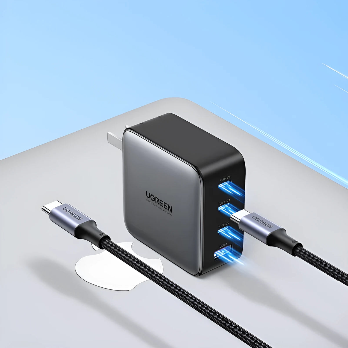 100W Gallium Nitride multi-port fast charger plug on a white background.