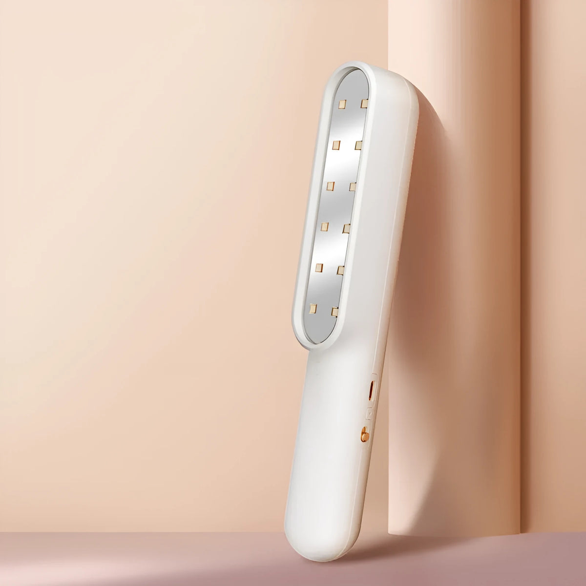 Portable UV hand-held sterilisation lamp in white, 219x34x40mm rechargeable design