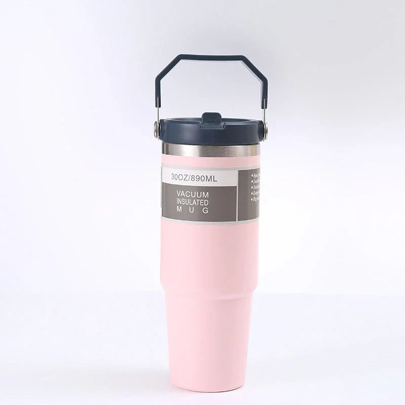 Insulated stainless steel travel tumbler with double-wall vacuum technology, sweat-proof powder coating, and BPA-free sliding lid for hot and cold drinks on the go.