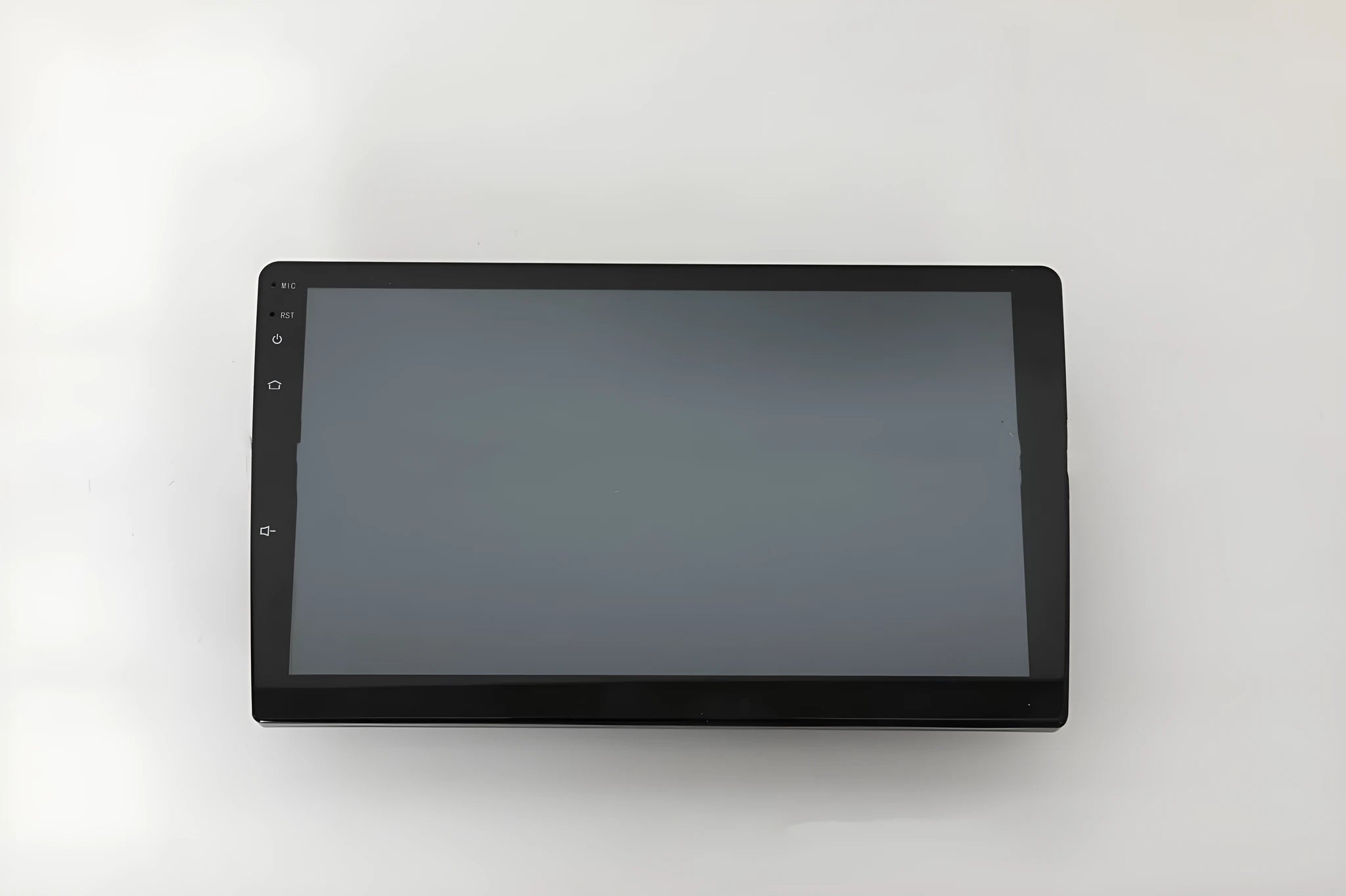 Black universal 10.1 inch Android car stereo touchscreen head unit with trapezoid panel