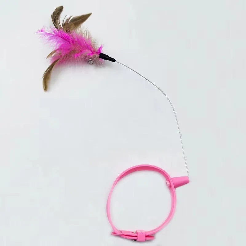 Blue adjustable cat collar with feathers and bell, plus a teasing wand with a soft silicone tip.