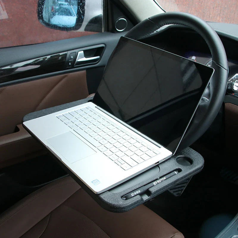 Versatile car desk tray with adjustable steering wheel mount, providing a secure and ergonomic platform for work, entertainment, and more while on the road.