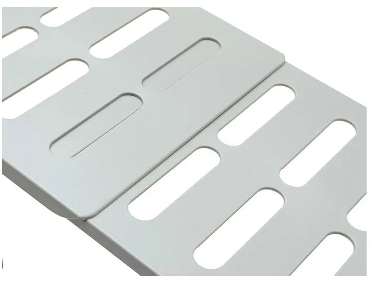 White telescopic plastic kitchen rack at extended height with ground installation