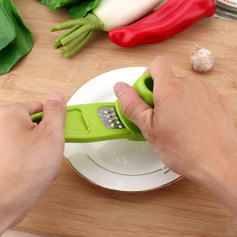Eco-friendly garlic masher and seasoning grinder in rose red and light green