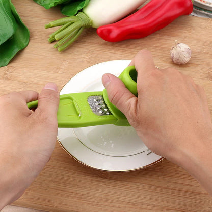 Eco-friendly garlic masher and seasoning grinder in rose red and light green