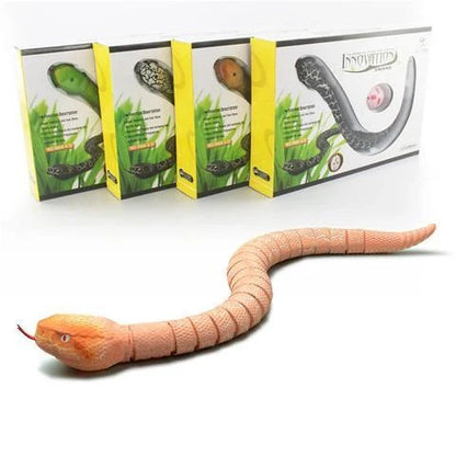 Remote control rattlesnake toy with realistic slithering motion and egg-shaped controller