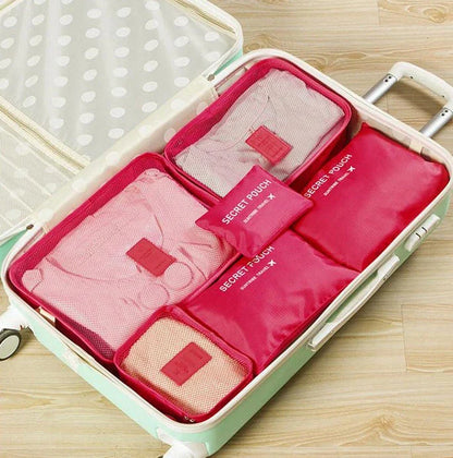 Durable waterproof packing cubes in various colors for organized, efficient travel