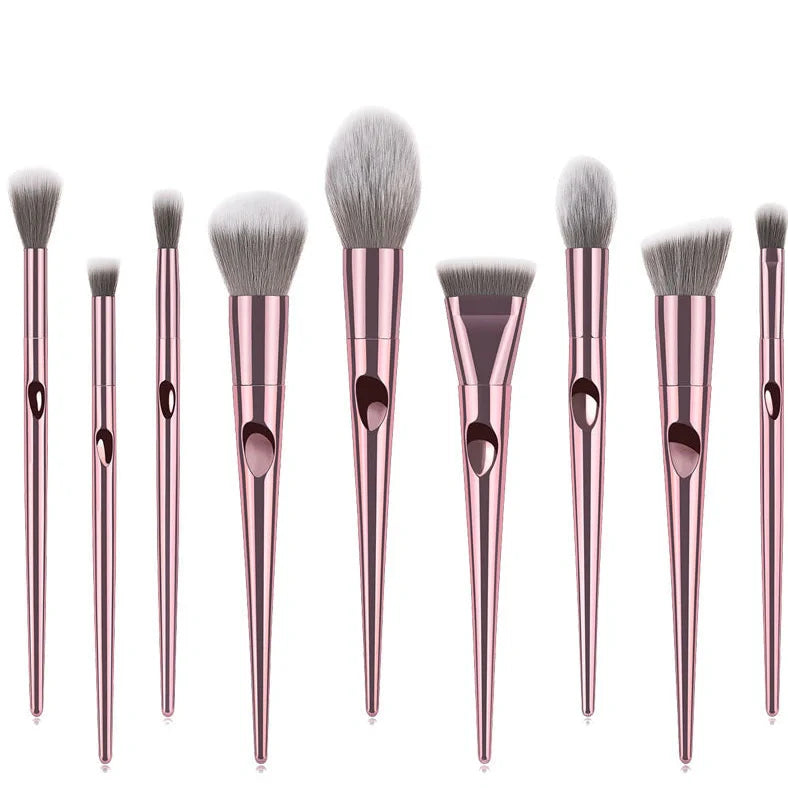 10-piece thumbprint grip makeup brush set with nylon bristles and plastic handles providing precise application control for professional and everyday makeup routines