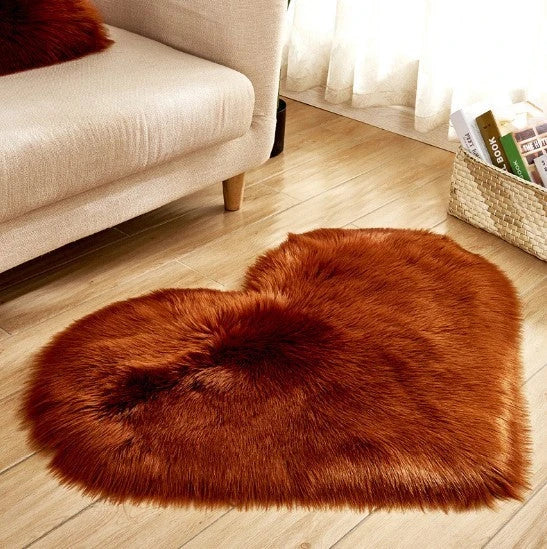 Soft, plush heart-shaped rug in various colors and sizes for comfortable home decor