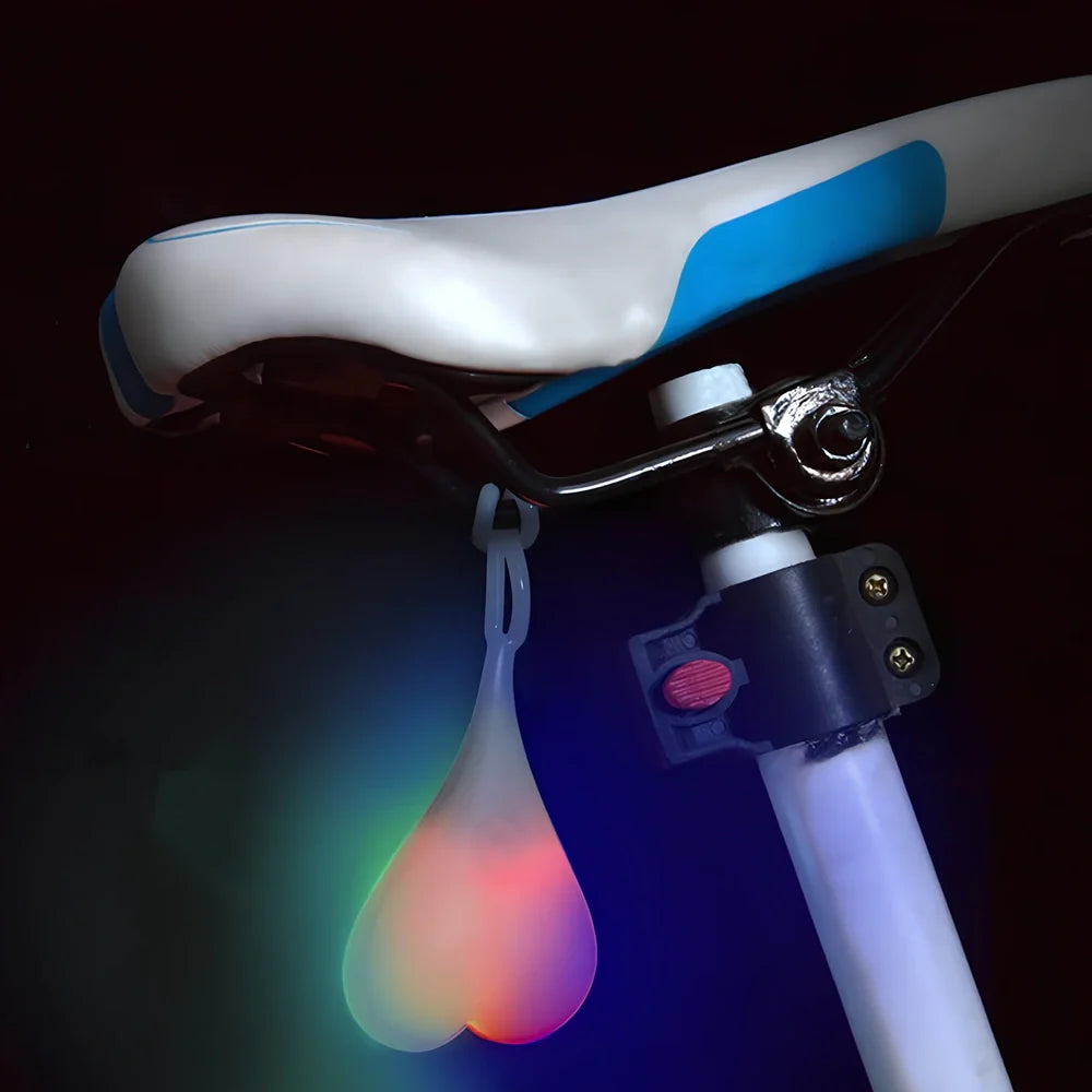 Blue beating heart silicone bike rear light, 15 cm long, touch-activated and waterproof for night cycling safety