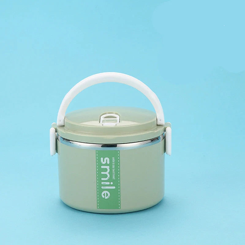 Stainless steel lunch box with built-in spoon, leak-proof design, in green, pink, and blue