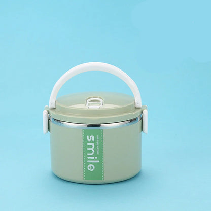 Stainless steel lunch box with built-in spoon, leak-proof design, in green, pink, and blue