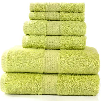 Pure cotton absorbent towel set in bamboo green, showing 140x70cm bath, 33x73cm hand, and 33x33cm square towels