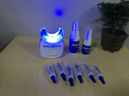 Cold light teeth whitening device with medical polymer construction for stain removal
