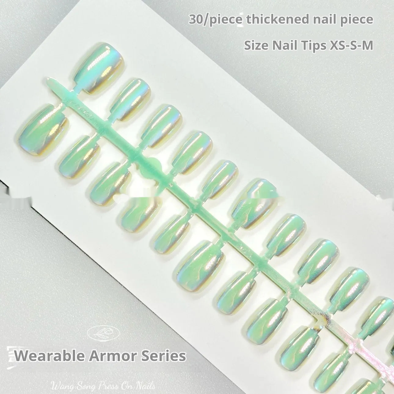 Electroplated cat's eye artificial gel nails in short ladder XS, S, and M sizes showing aurora and solid colour styles.