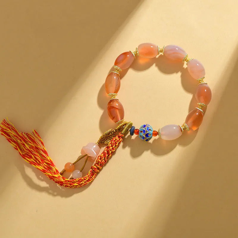 Jinsi jade agate Tibetan bracelet with carved lily flower motif and geometric shapes