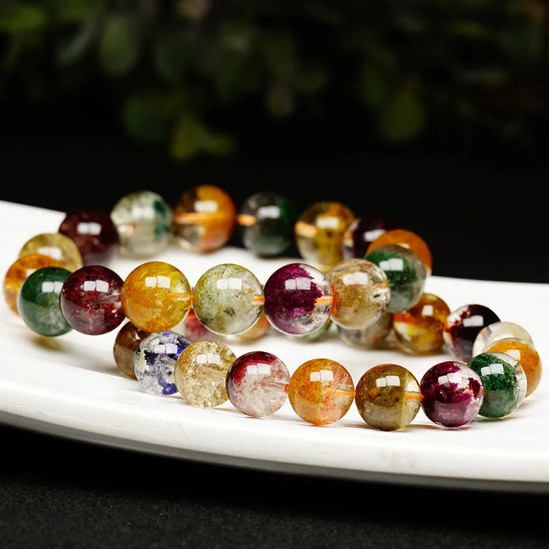Ethnic style crystal ball bracelet with colourful ghost cornucopia design on 10mm beads.