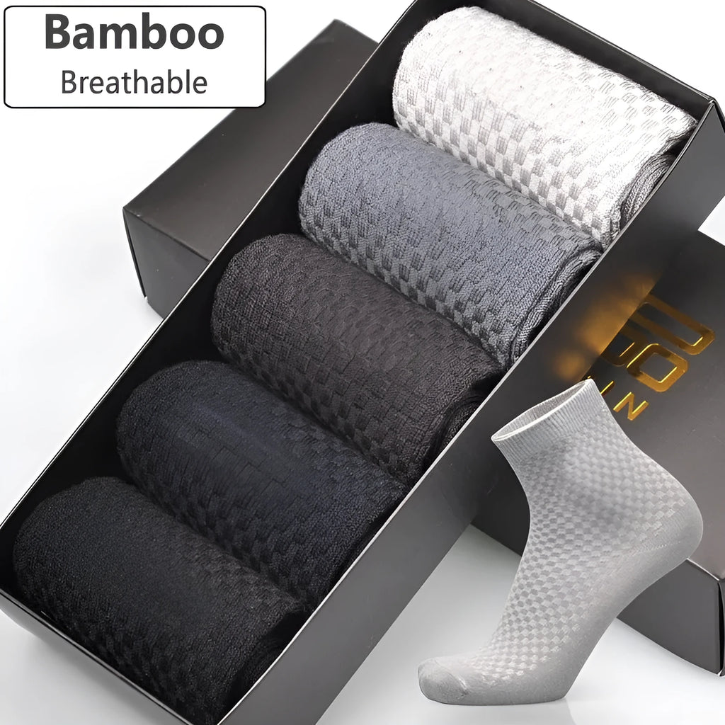 A pair of men's bamboo fibre ankle socks with a small square pattern, shown in one of the five available colours.