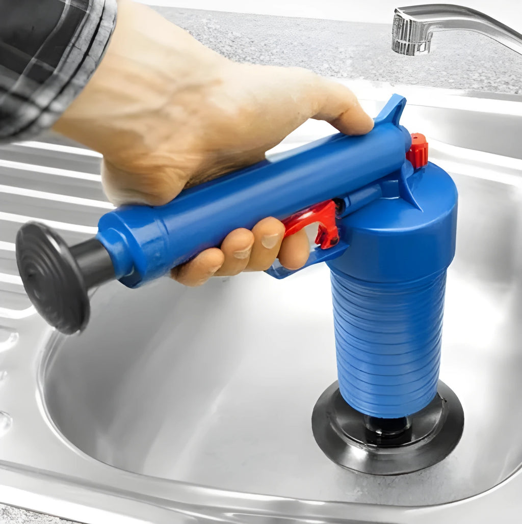 Plastic air power drain blaster gun with four different sized rubber suction cup adaptors for unblocking pipes
