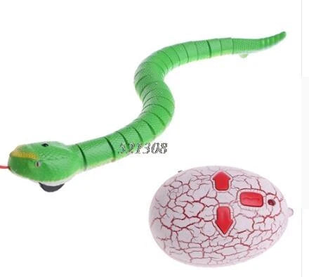 Remote control rattlesnake toy with realistic slithering motion and egg-shaped controller