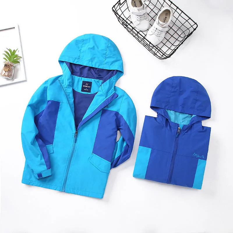 Boy wearing a blue zip-up sanded acetate jacket for autumn