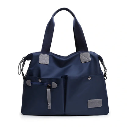 Ladies shoulder bag in black Oxford fabric, size M with multiple pockets and adjustable straps for handbag or crossbody carry, 340 mm width