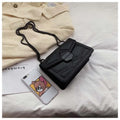 Small square shoulder bag with studs, chain handle, black colour, flat lay view