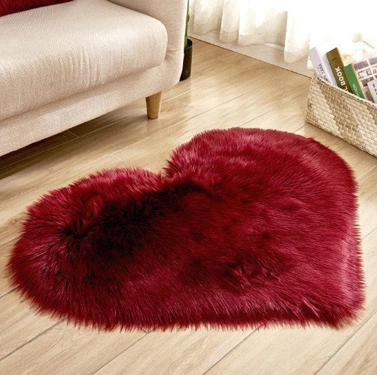 Soft, plush heart-shaped rug in various colors and sizes for comfortable home decor