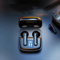 Dark night black and ivory white wireless Bluetooth earbuds with semi-in-ear design and digital battery display.