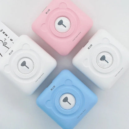 Portable handheld label mini thermal printer in white, pink, or blue