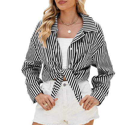 Stylish striped shirt with pockets, featuring a comfortable loose fit and unique collage design for fashion-forward casual wear.