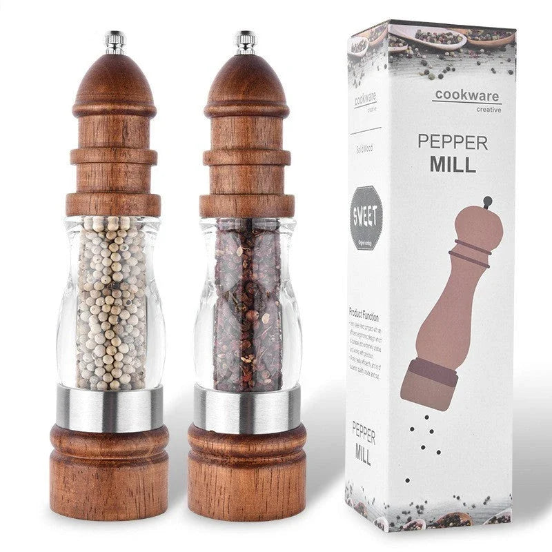 Wooden Salt and Pepper Grinder Set with adjustable coarseness on kitchen table