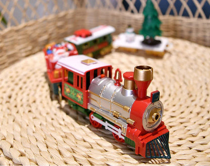 Christmas toy train set with lights and sounds on railway tracks