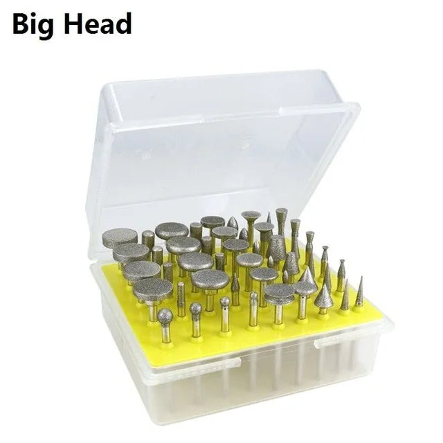 Set of alloy grinding heads with elliptical cone diamond and golden diamond tips on a white background.