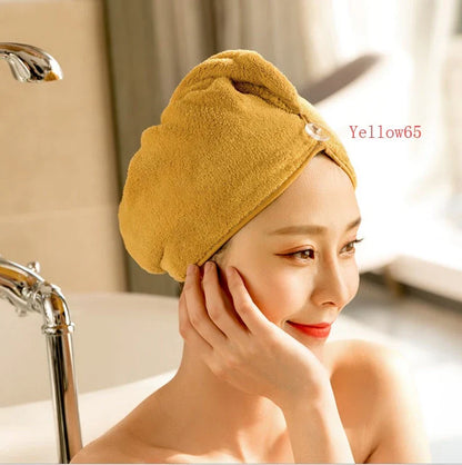 Absorbent microfiber hair turban in various vibrant colours, designed for fast and convenient drying