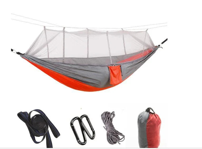 Parachute hammock with mosquito net in various colors and sizes, ideal for outdoor adventures and relaxation
