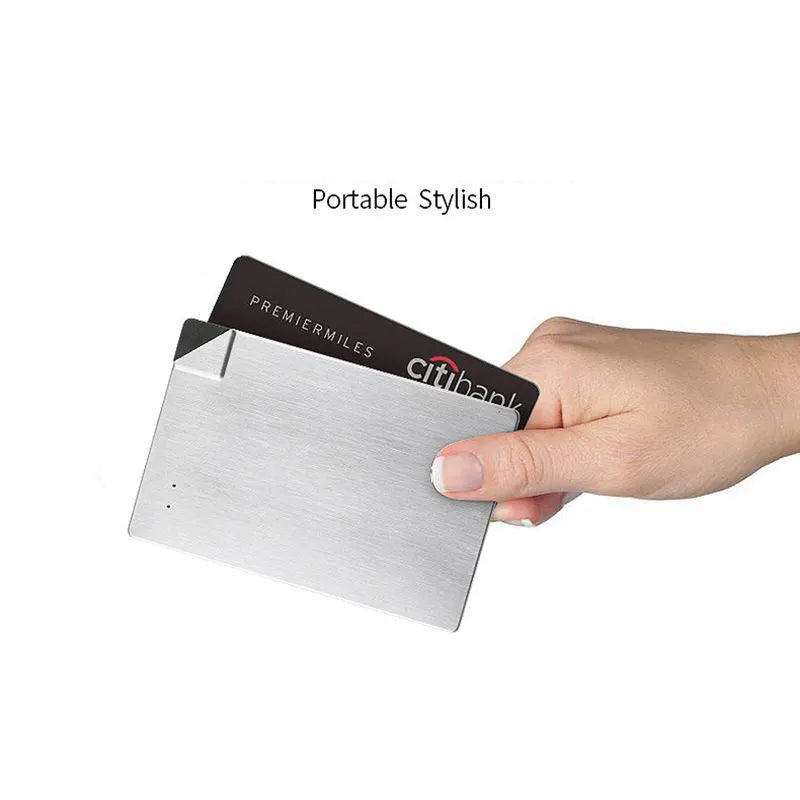 Silver ultra-thin graphene power bank measuring 140mm by 72mm by 4mm