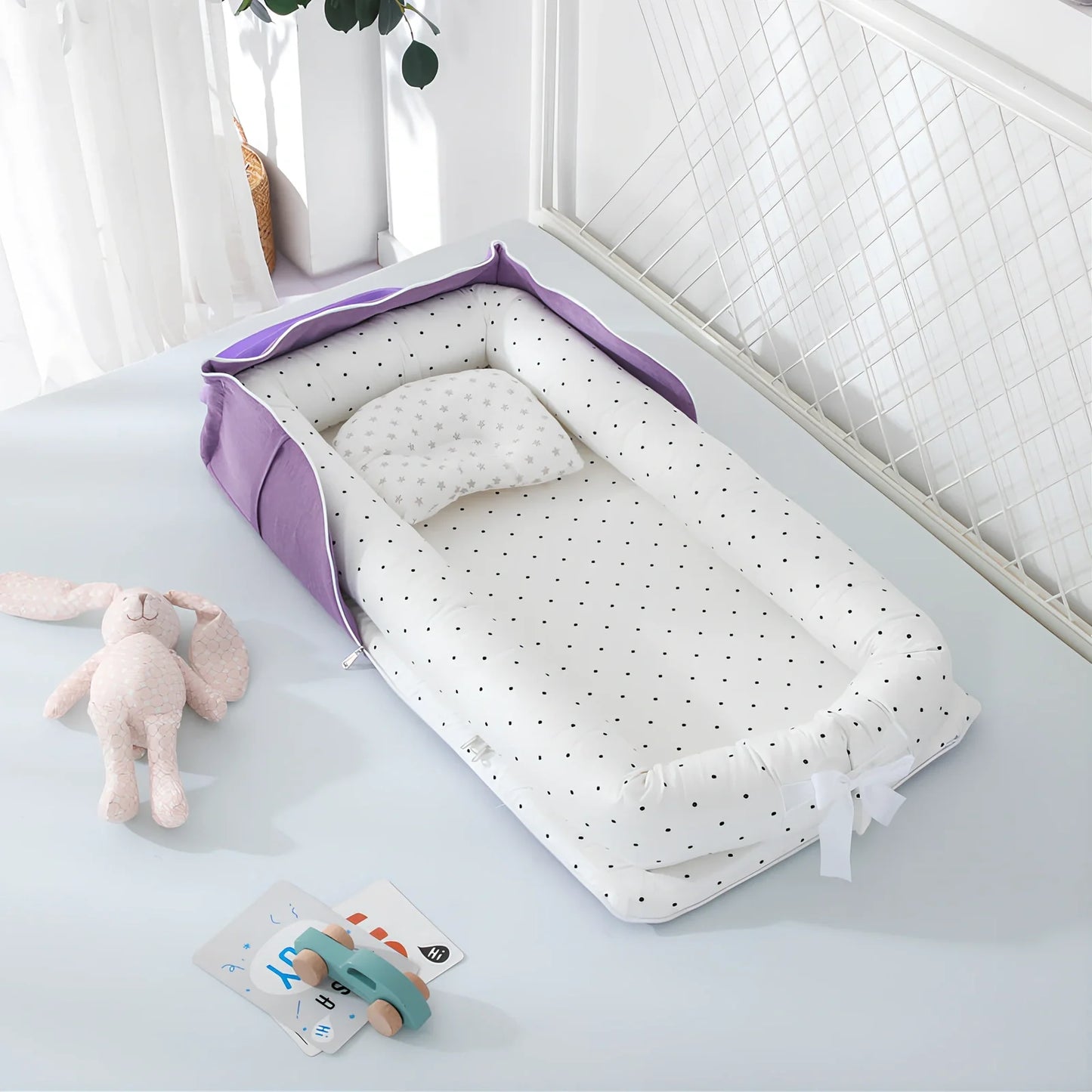 Foldable cotton portable baby crib in Animal World Blue, 90x50 cm with pillow and strap, weighing 1.3 kg