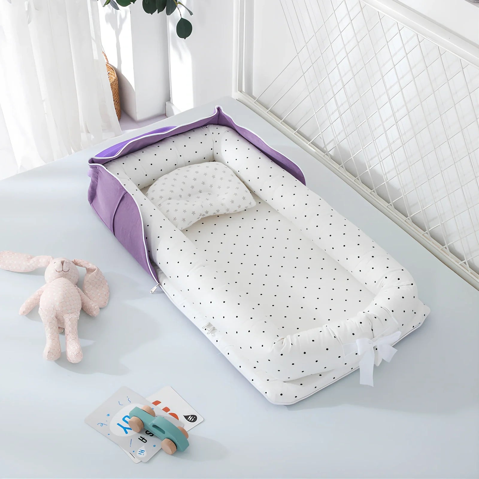 Foldable cotton portable baby crib in Animal World Blue, 90x50 cm with pillow and strap, weighing 1.3 kg