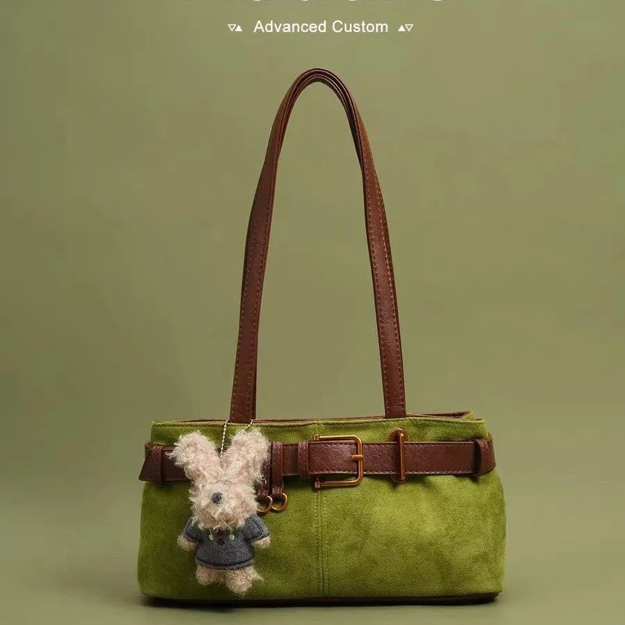 Horizontal square cotton single shoulder tote bag with double straps, green colour-blocked stitching, and welt pocket