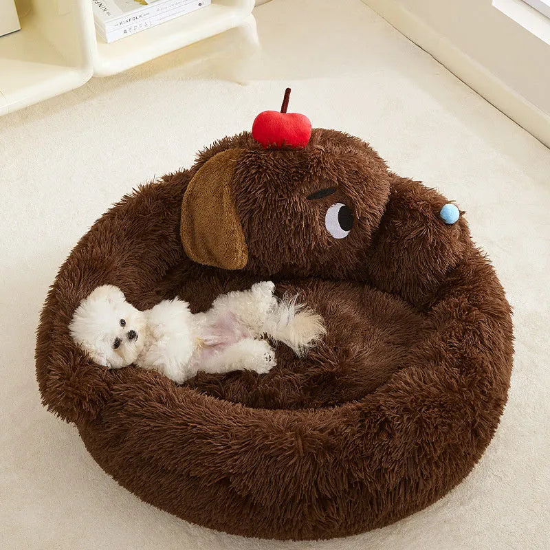 A grey plush sofa-style pet bed with high bolsters on three sides, shown in two sizes.
