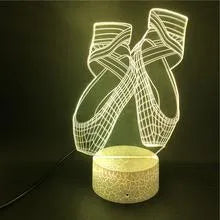 3D ballet dancer silhouette night light on a base with remote control, showing multiple colour options.