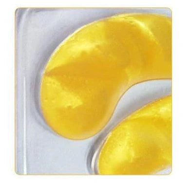 Gold crystal collagen eye patches applied under eyes for dark circle and fine line treatment