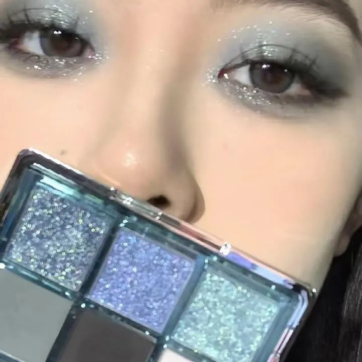 MUGELEEN nine-colour eye shadow palette with blue smoked colours and earth tones