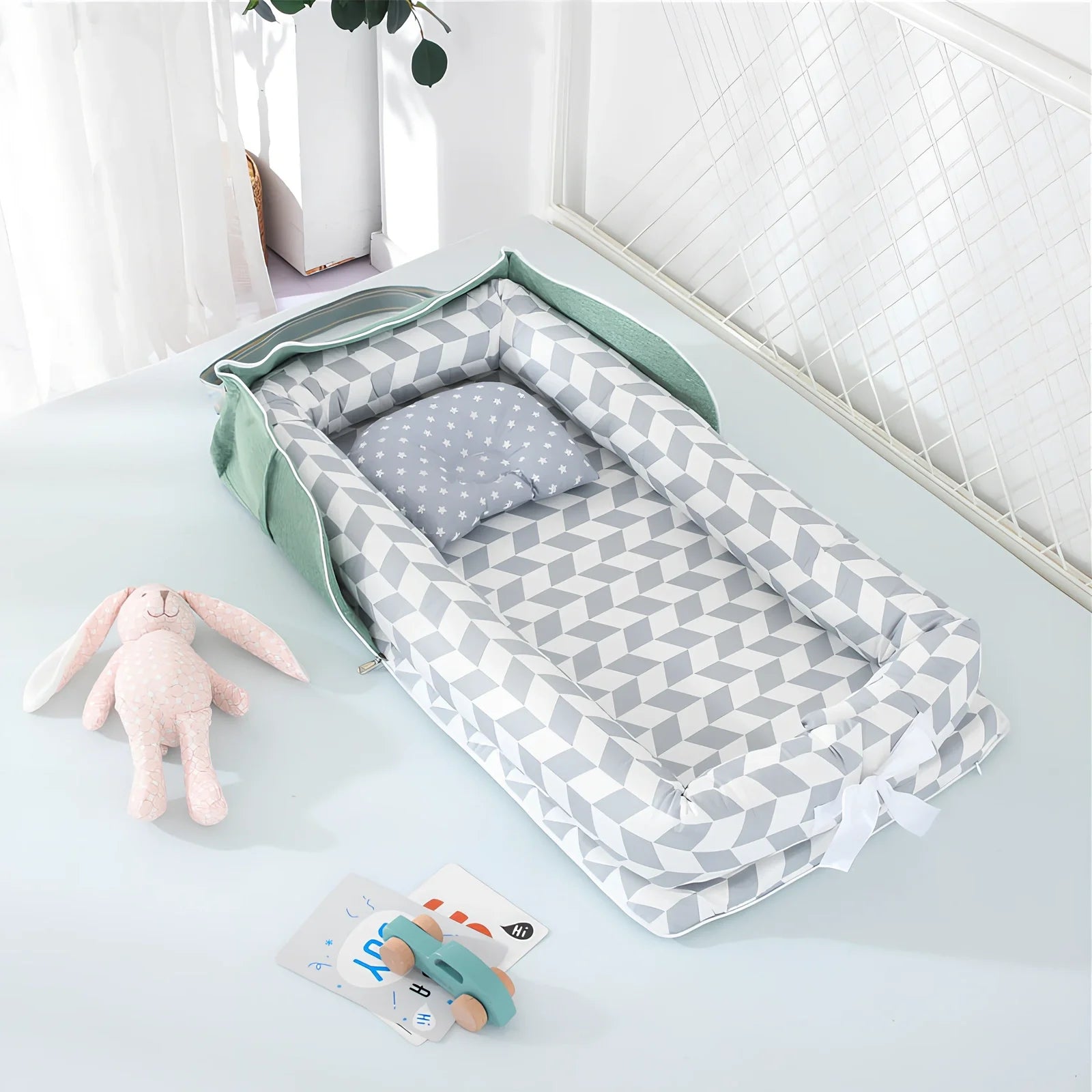 Foldable cotton portable baby crib in Animal World Blue, 90x50 cm with pillow and strap, weighing 1.3 kg