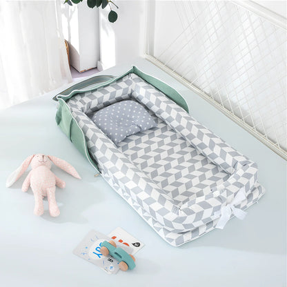 Foldable cotton portable baby crib in Animal World Blue, 90x50 cm with pillow and strap, weighing 1.3 kg