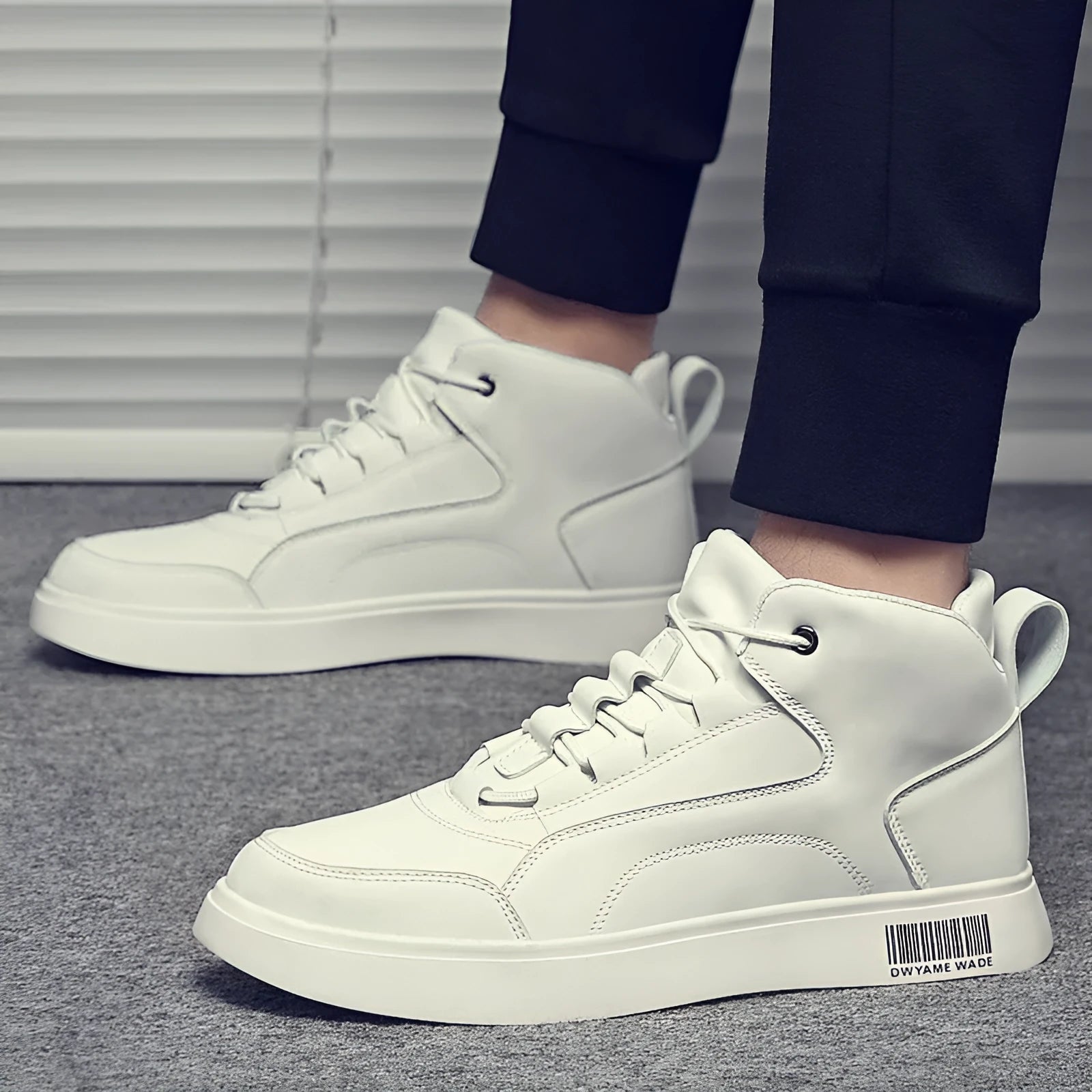 Men's white mid-top casual lace-up sneakers with a round toe and rubber sole