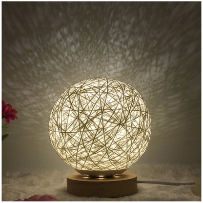 LED rattan table lamp with hand-knit lampshade in various colours