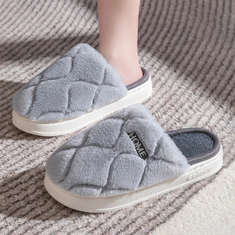 Cozy plush slippers with soft, plush upper material and durable PVC sole for comfortable and secure indoor wear